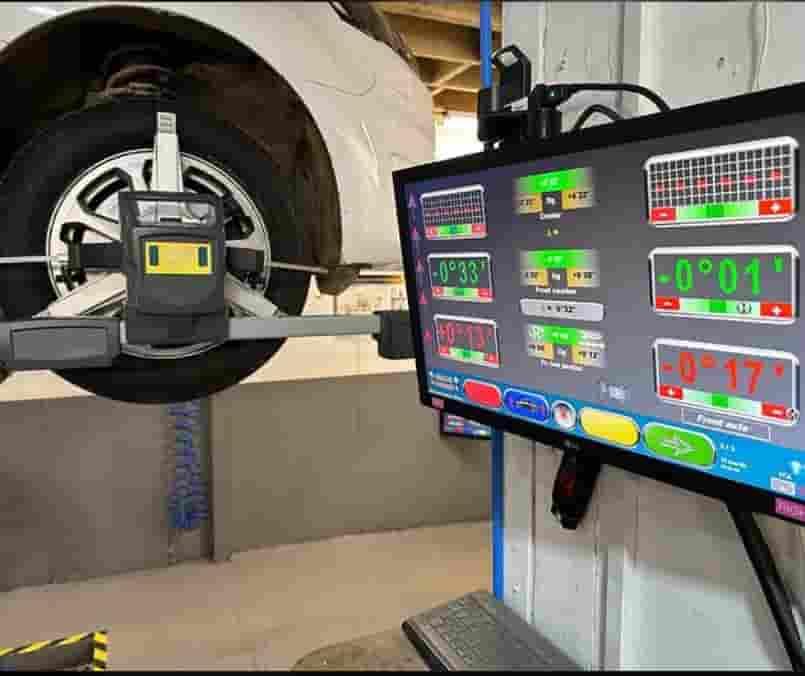 Precision Tesla wheel alignment equipment in Houston